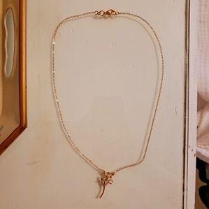 FREE W ANY CLOTHING PURCHASE Gold rose necklace